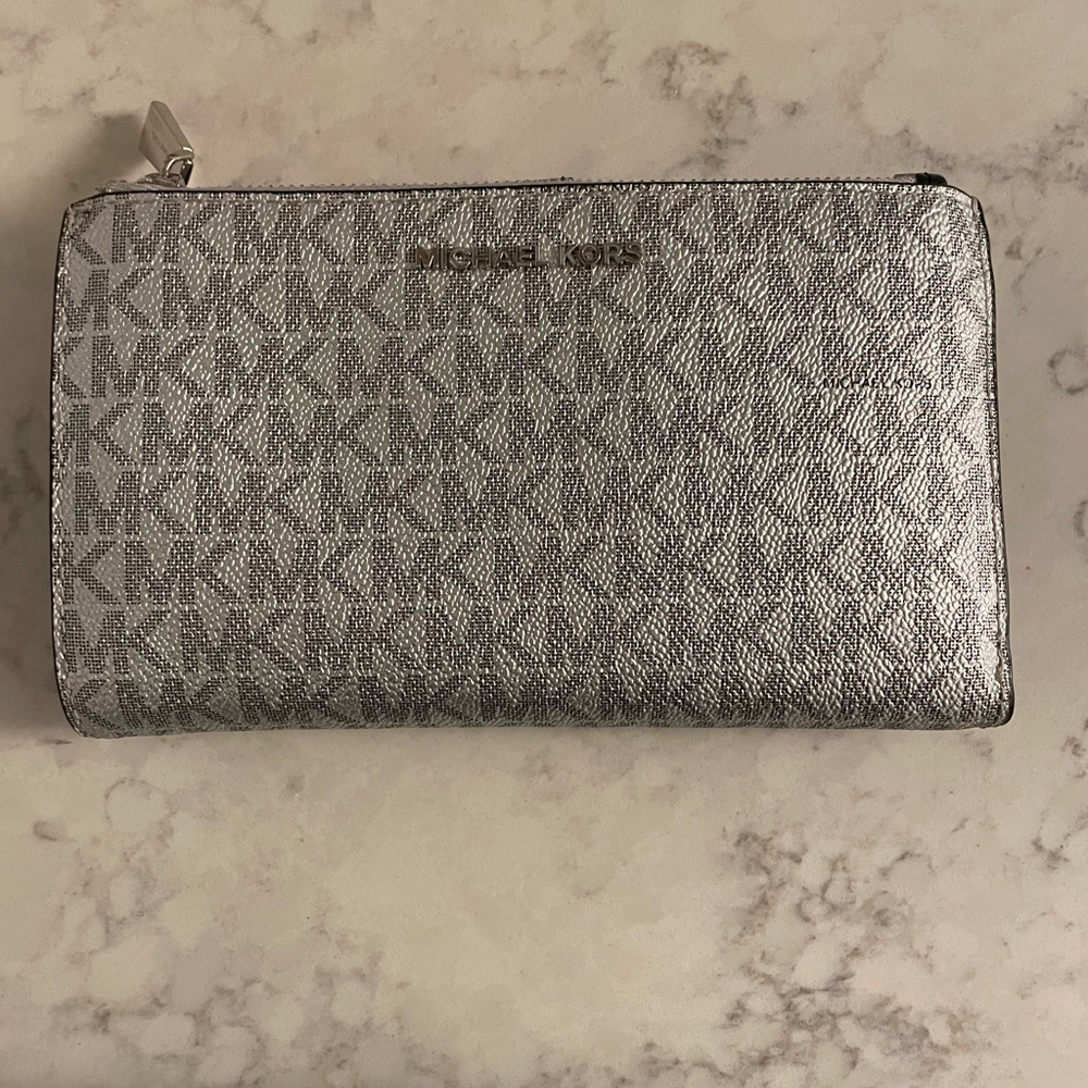 Jet Set Metallic Signature Logo Smartphone Wallet. Sold out online